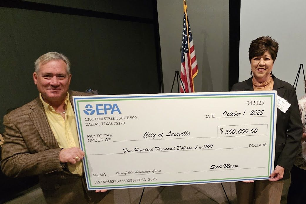 Patti Larney and Grant Bush recieve Brownfield award